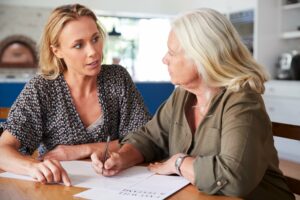 Two people deciding who pays for contesting a Will